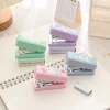 Portable and cute cartoon mini small stapler set, No. 12 student office small needle feeding stapler wholesale Application Scenario